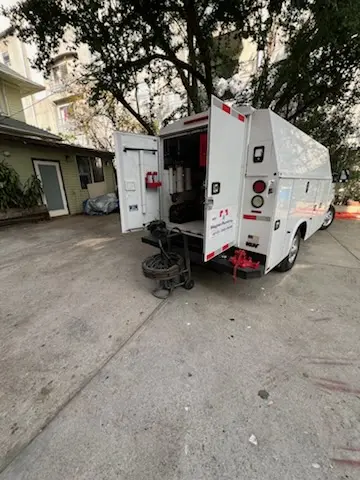 Magnet Plumbing service vehicle on-site for Slab Leak Repair in Melrose Place